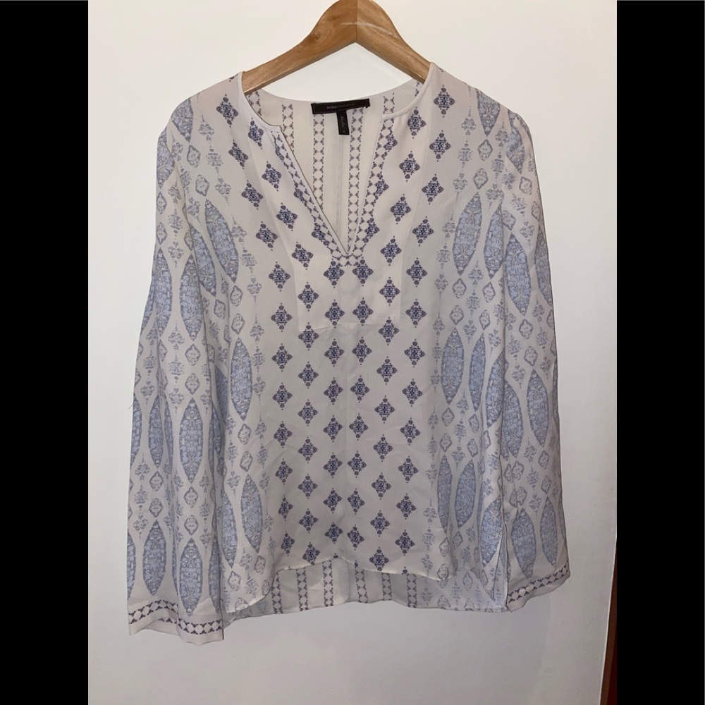 Blue, purple, white patterned blouse